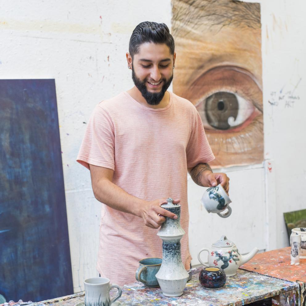 students working on ceramics