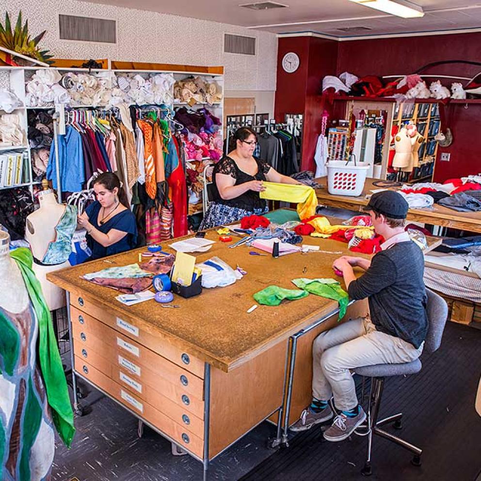 Students working in the costume shop