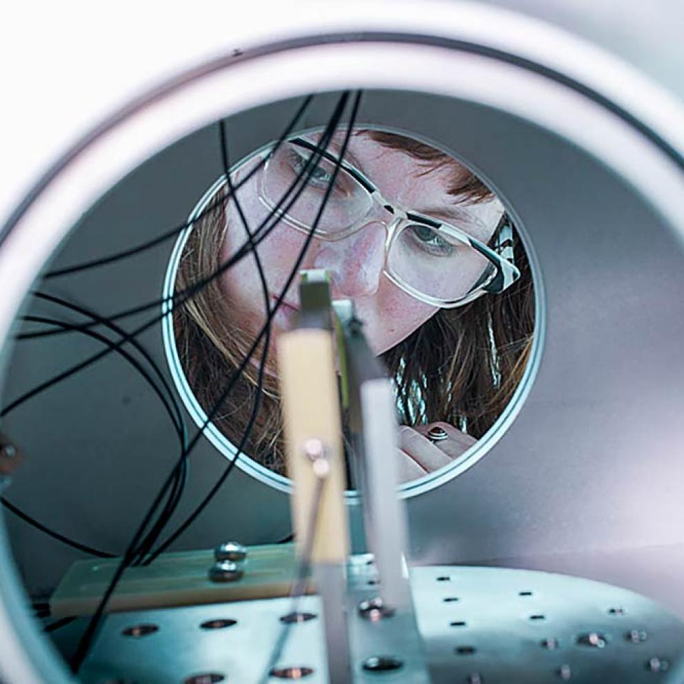 Student working in Gravitational Research Lab