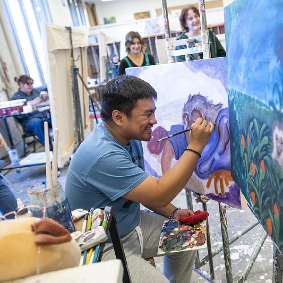 Student working on painting during Painting Class