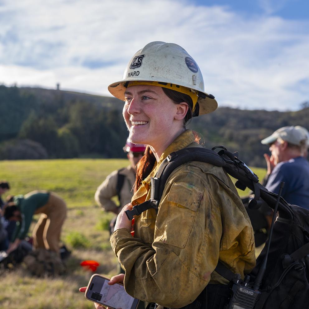 A forestry student in the field