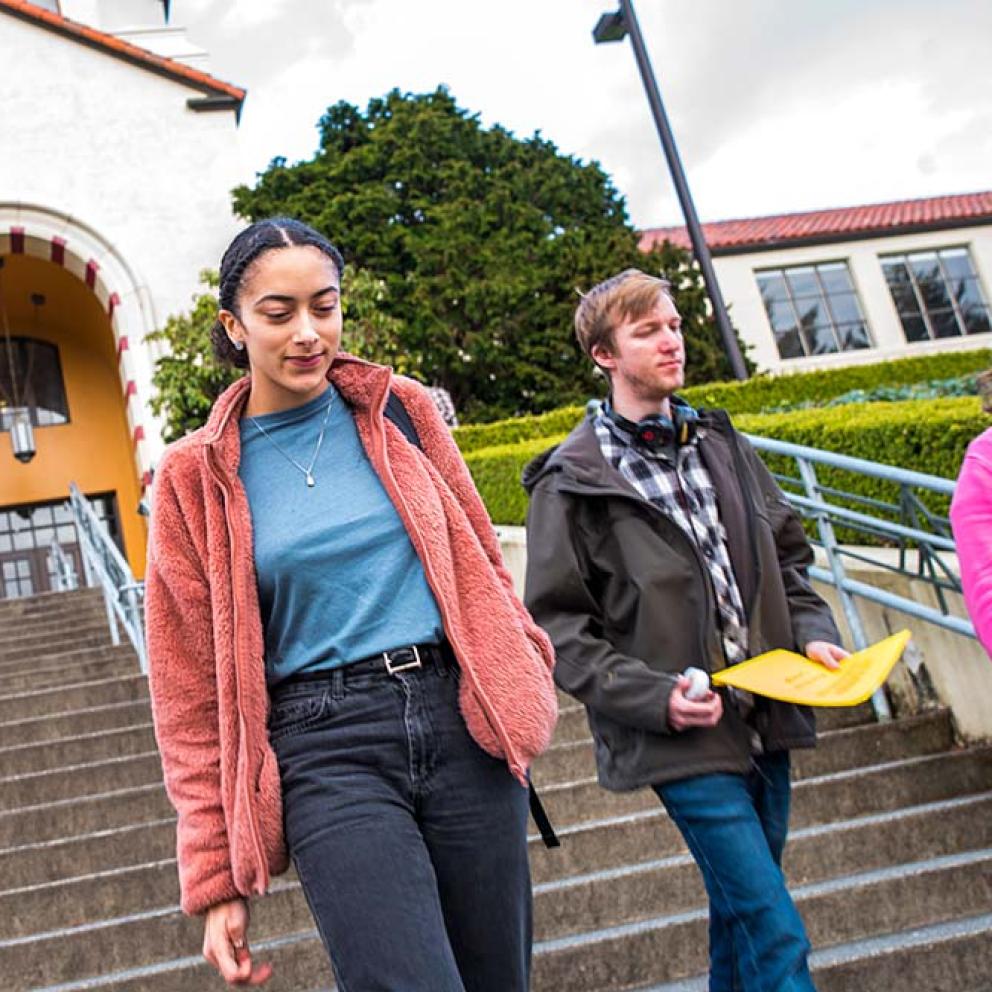 Students walking down stairs