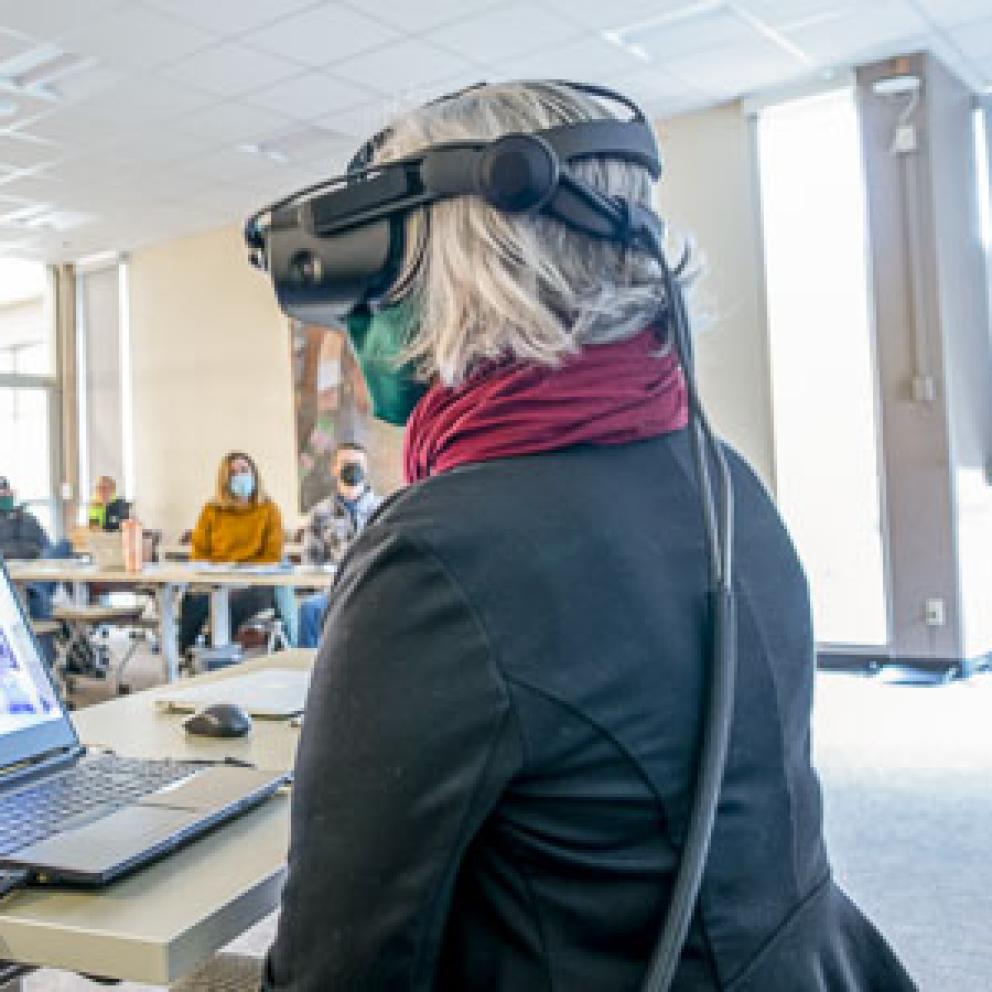person looking through VR headset