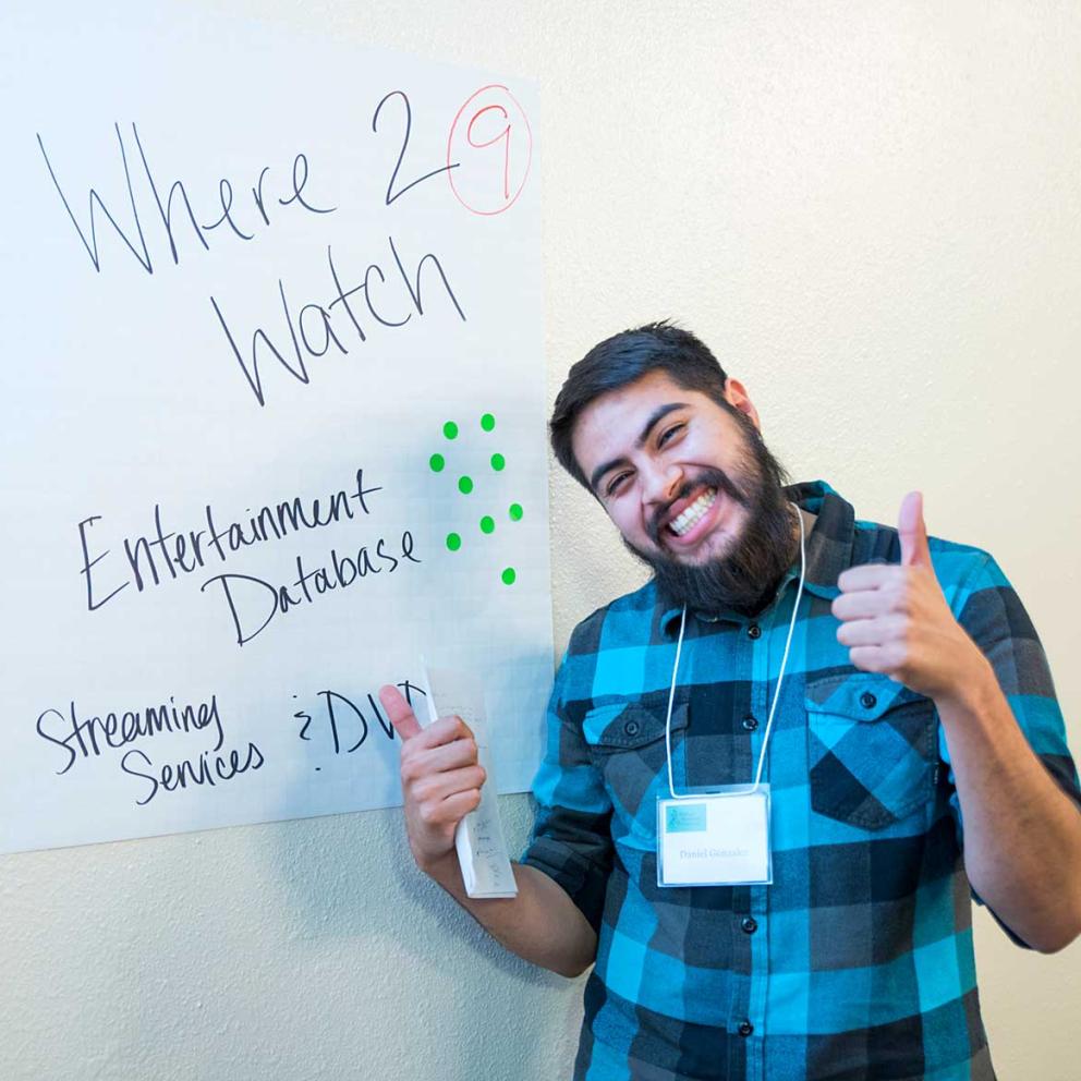 Student standing at white board