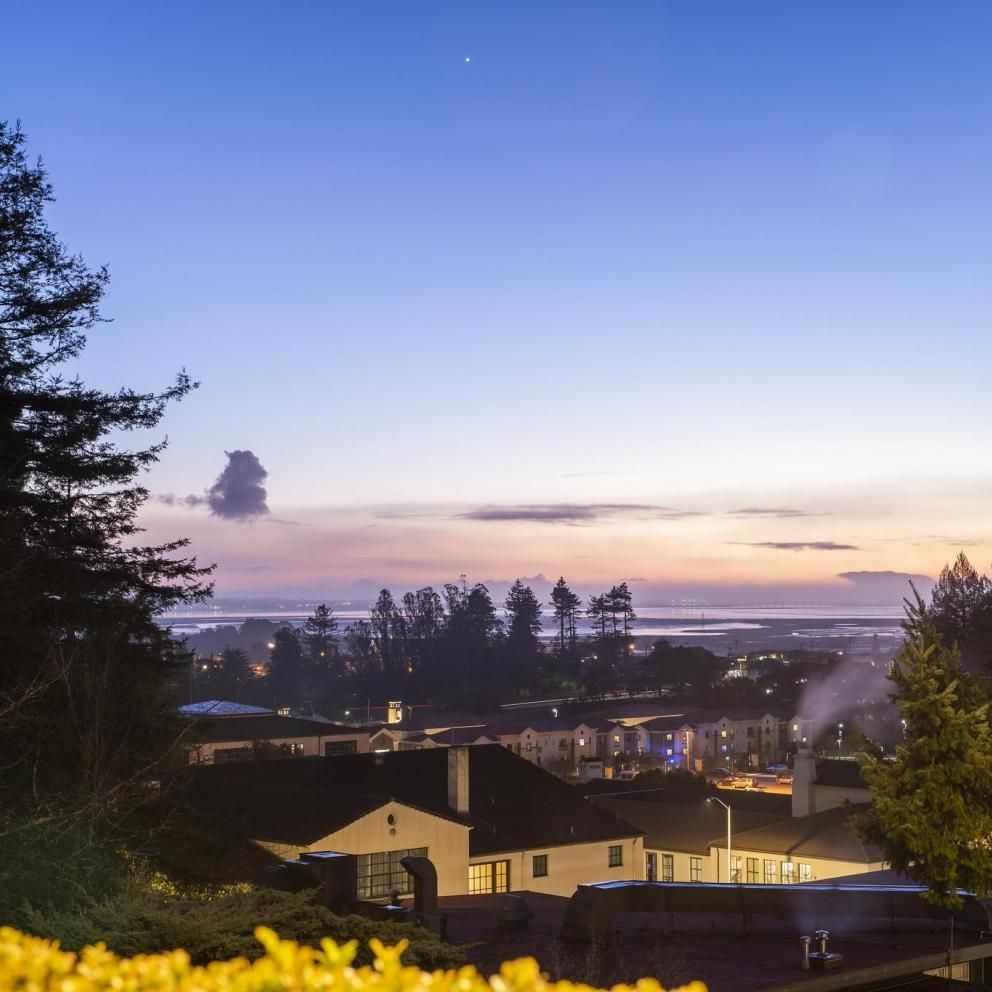 Photo shows an evening view of the Humboldt Bay, looking south-west from Founders Hall.