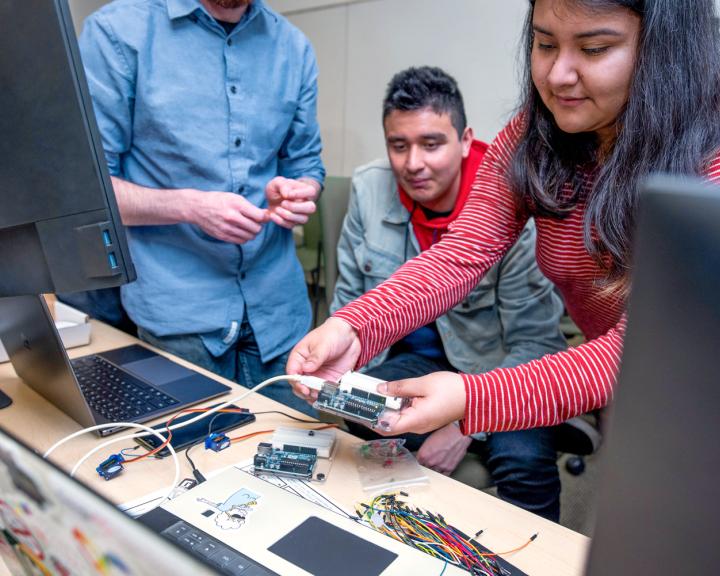 Students working with computer parts