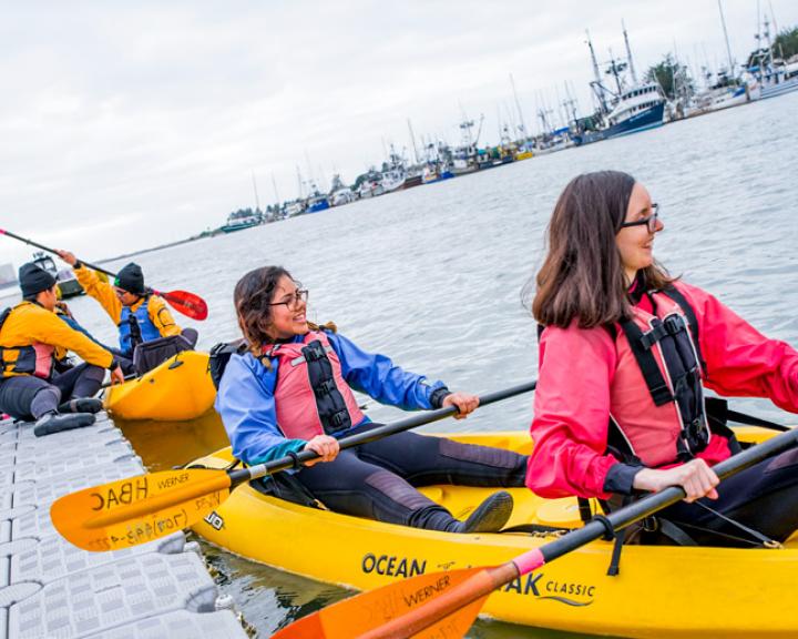 students in the kayak