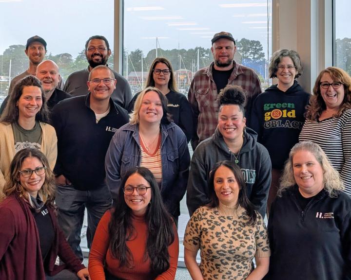 A Group of smiling Academic Advising Center Advisors 