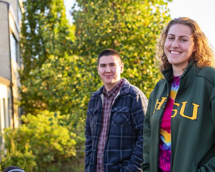 two students smiling