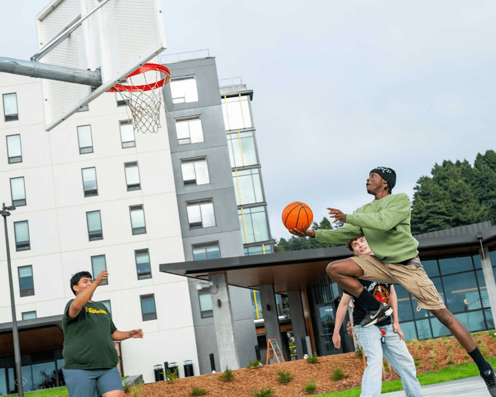 Students playing basketball.