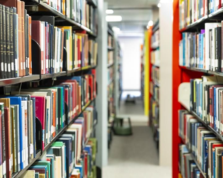Aisle of books in library