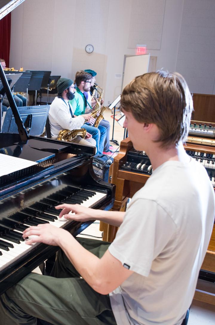 student playing the piano