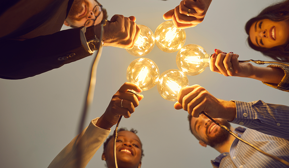 collaborating people with lightbulb