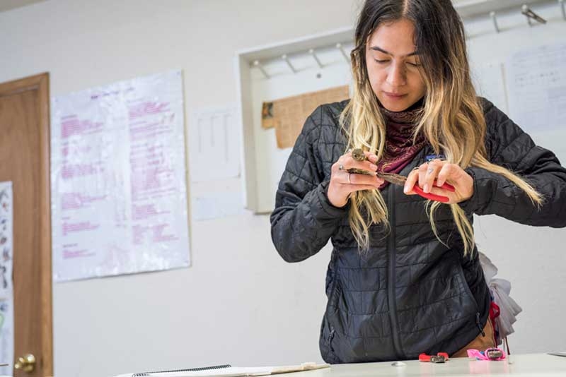 Student with tool