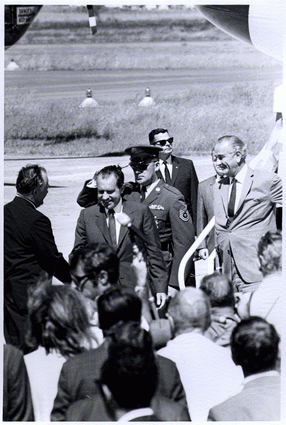 Clausen greets former President Nixon at the airport